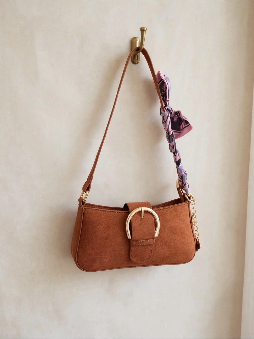 Women’s Tan Suede Shoulder Bag with Gold Buckle Accent